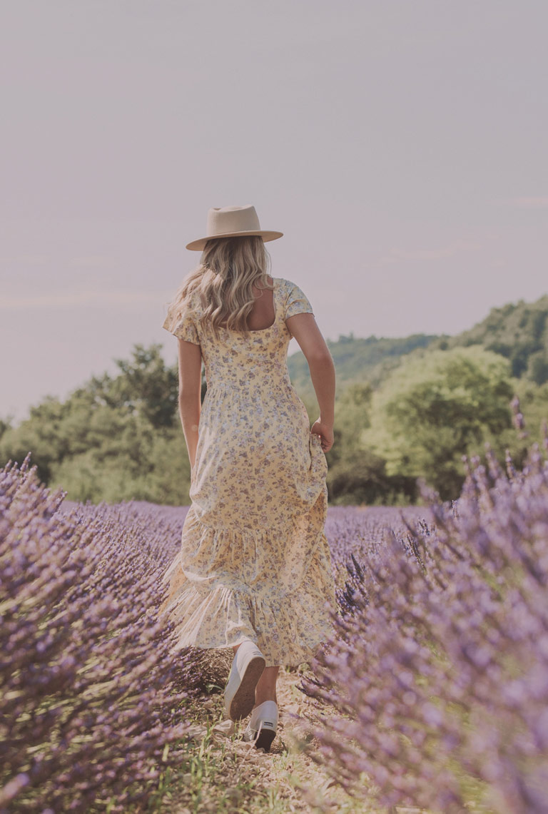 A Girl With Golden Hairs walking in the fields