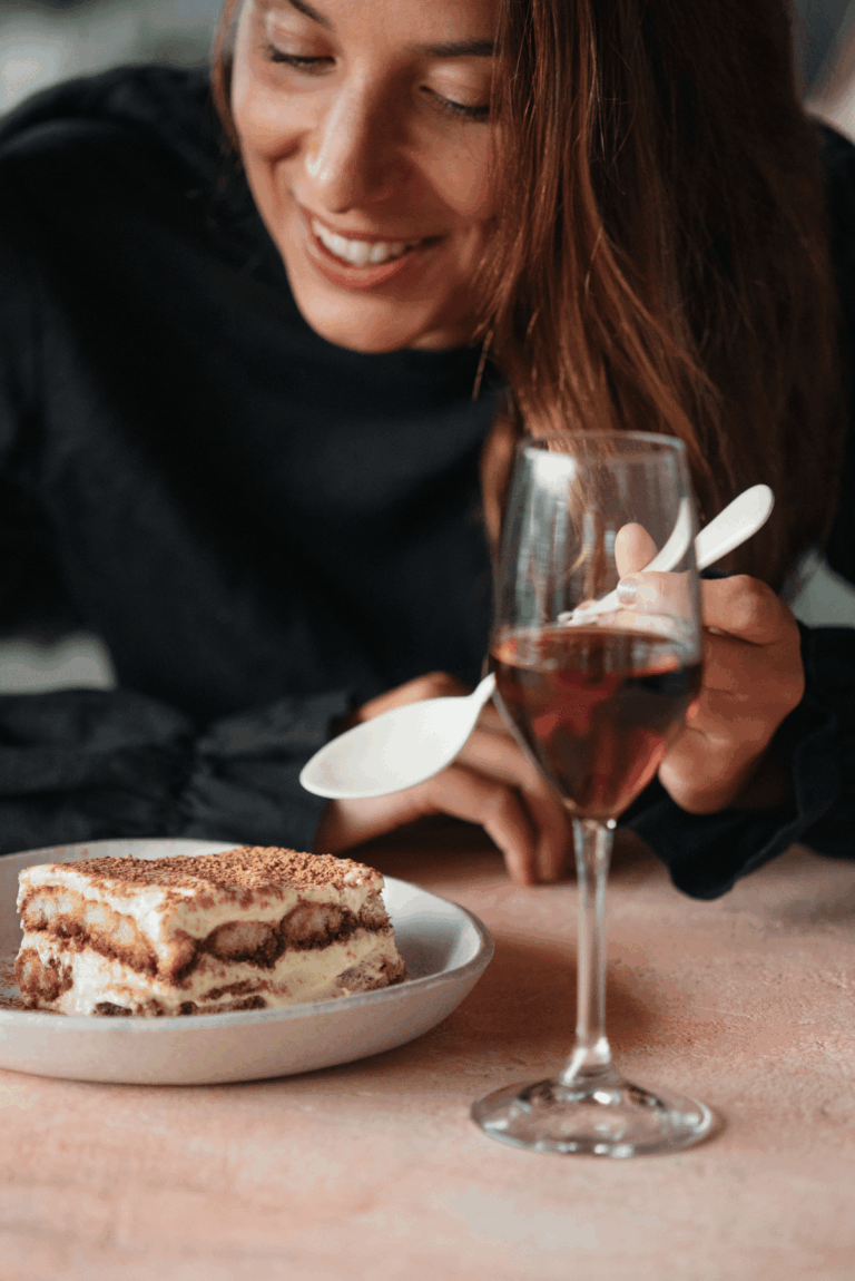 Italian Street Kitchen's Isabella eating her Tiramisu recipe